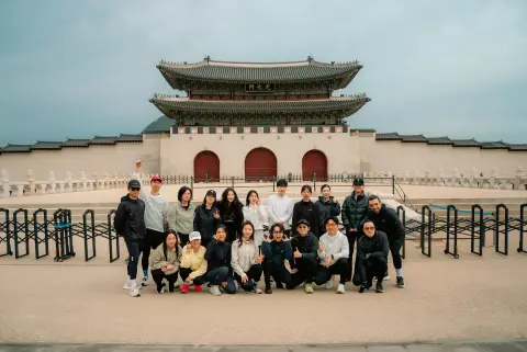 SMCC members posing for a group photo in front of Gwanghwamun